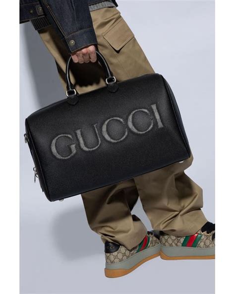 gucci gold leather pics|Gucci black leather duffle bag.